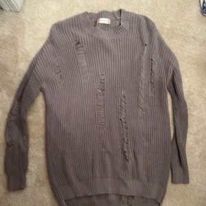 Sweater with rips